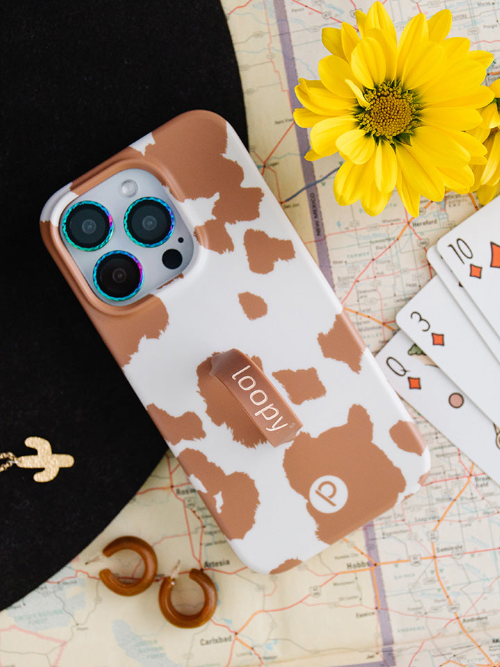 A Brown Cow Print Loopy Case.|| feature-media