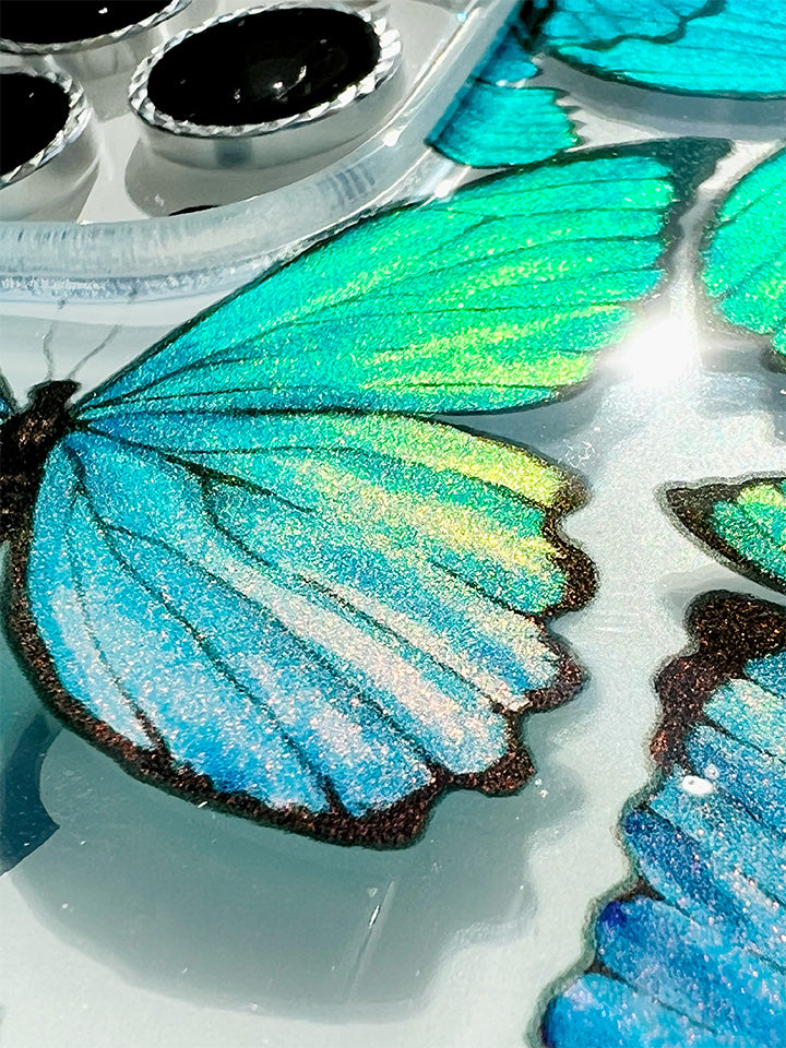 A close up of a Butterflies Loopy Case. || feature-media