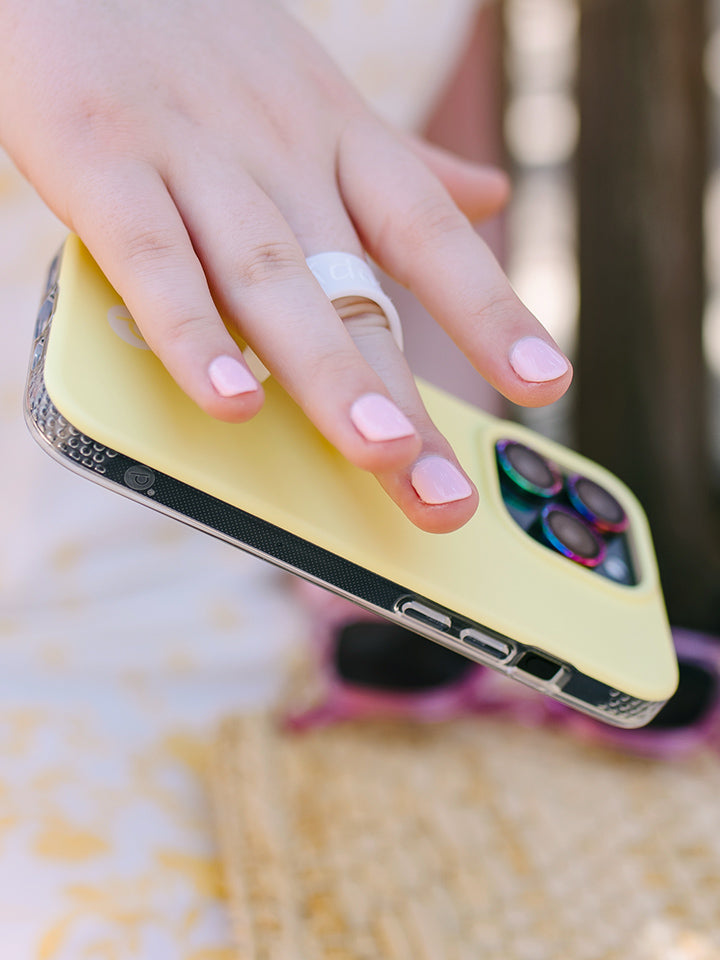 A woman holding a Honeybee Loopy Case.|| feature-media