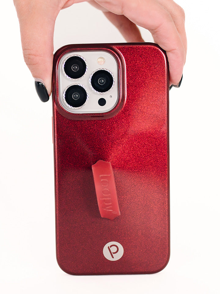 A woman holding a Maroon Shimmer Loopy Case.|| feature-media