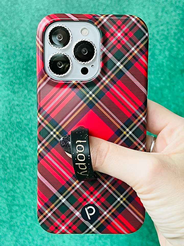 A woman holding a Red Tartan Plaid Loopy Case. || feature-media